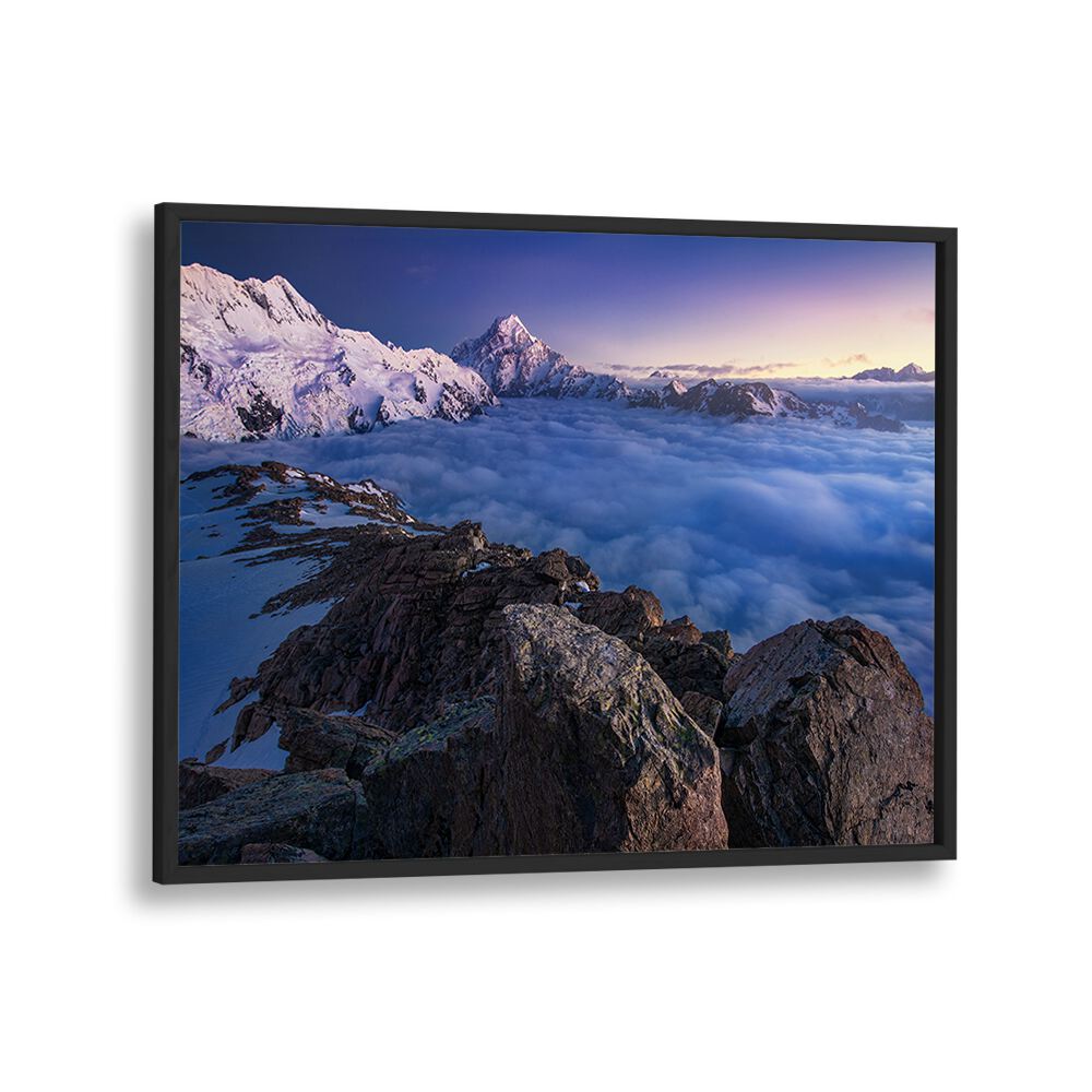 Breathtaking "Above the Clouds" photography prints showcasing majestic mountains above a sea of clouds. Perfect for any space.