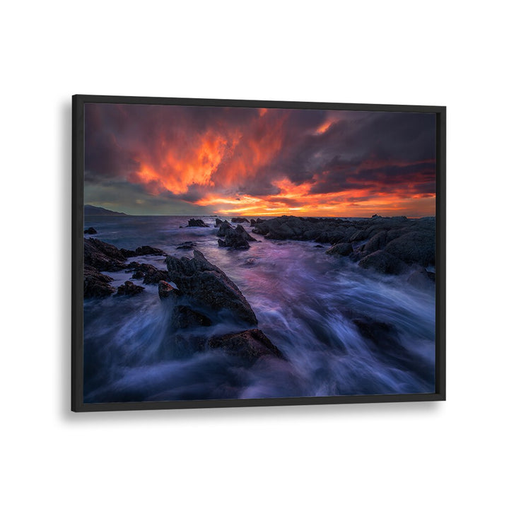 Stunning BURNING SKY, PHOTOGRAPHY PRINTS capturing vibrant sunset colors over rocky coastlines, perfect for any space.