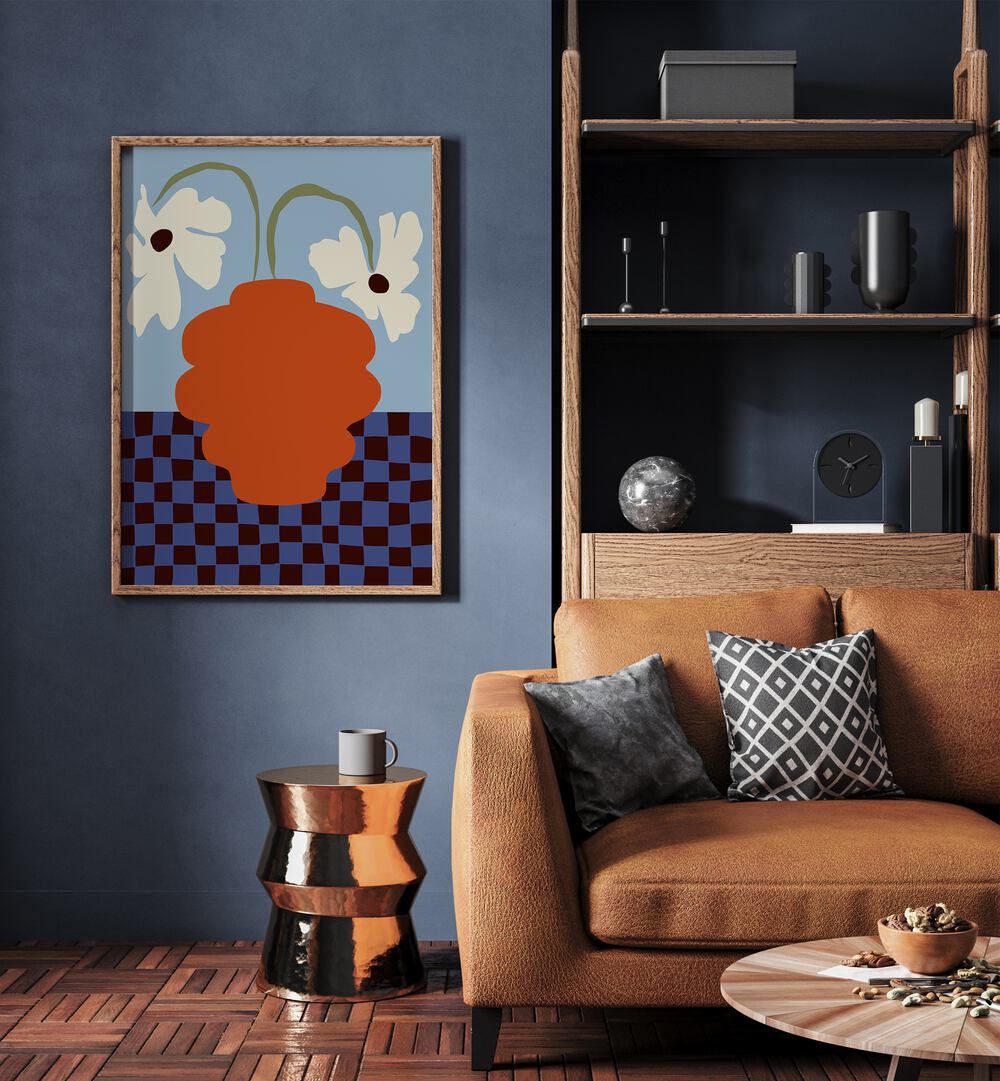 Blooming Dropping And Checkerboard, Botanical Art Paintings Artwork in Oak Wood Plain Frame
placed on a Blue Colored Wall
near a Brown Sofa
in the Living Room