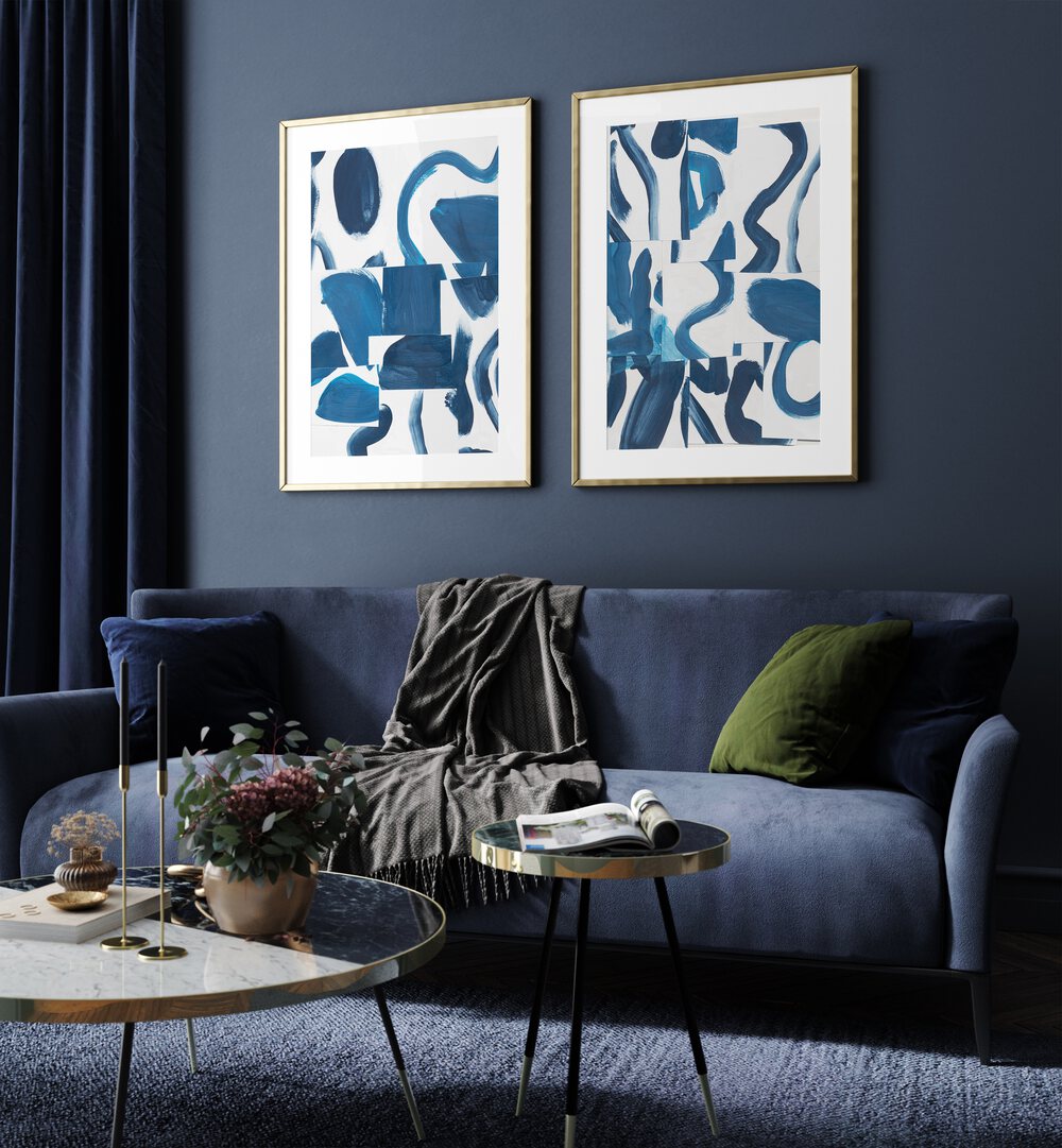 Elegant living room featuring the BLUE ABSTRACT SET, SET OF 2 PAINTINGS, showcasing bold blue brushstrokes.