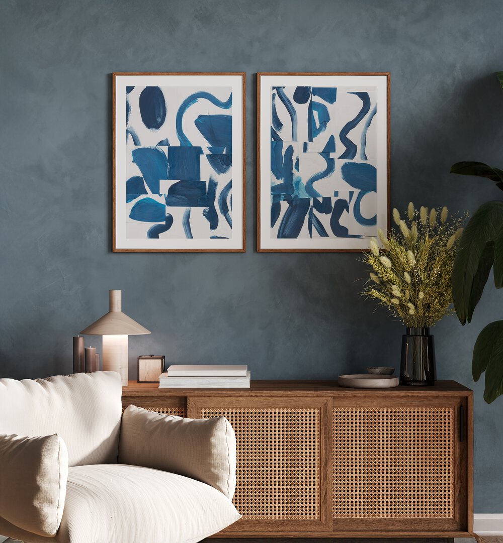 Enhance your decor with the BLUE ABSTRACT SET, SET OF 2 PAINTINGS featuring elegant blue brushstrokes.