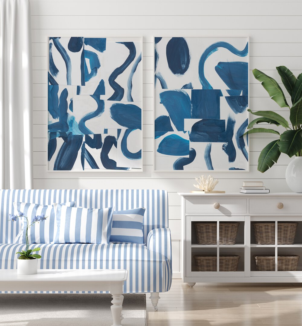 Elevate your decor with the BLUE ABSTRACT SET, SET OF 2 PAINTINGS, showcasing stunning blue brushstrokes.