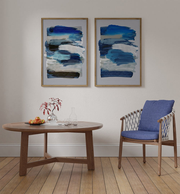 Stylish BLUE ABSTRACT STROKES SET, SET OF 2 PAINTINGS enhancing modern home décor with vibrant colors.
