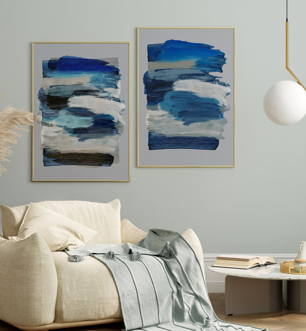Stylish BLUE ABSTRACT STROKES SET, SET OF 2 PAINTINGS enhancing modern home decor with vibrant blue hues.