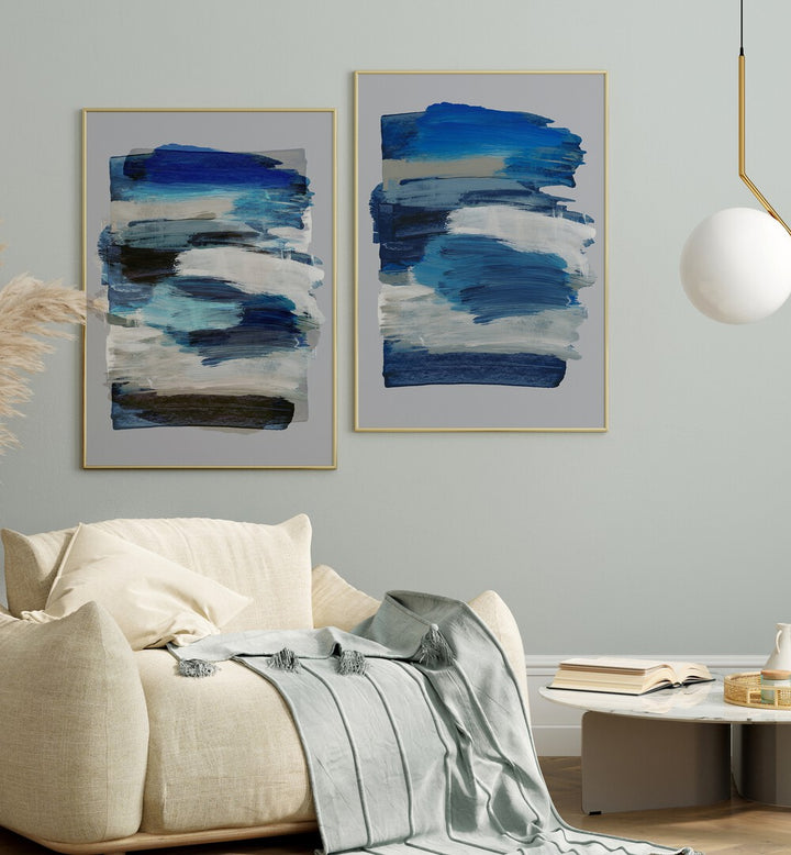 Stylish BLUE ABSTRACT STROKES SET, SET OF 2 PAINTINGS enhancing modern home decor with vibrant blue hues.