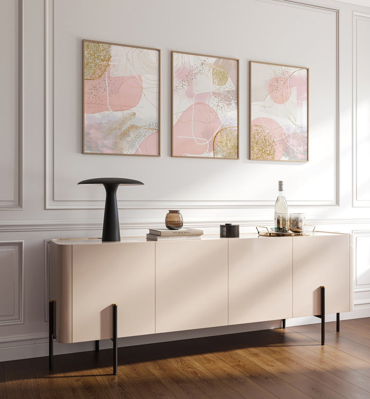 Elevate your decor with the BLUSH AND LUXE SET, SET OF 3 PAINTINGS, perfect for any modern living space.