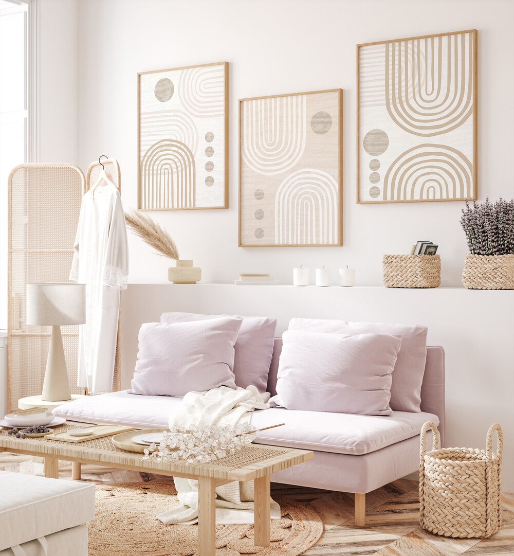 Stylish living room featuring the BUFF AND BOHO SET, SET OF 3 PAINTINGS, adding modern bohemian charm to decor.