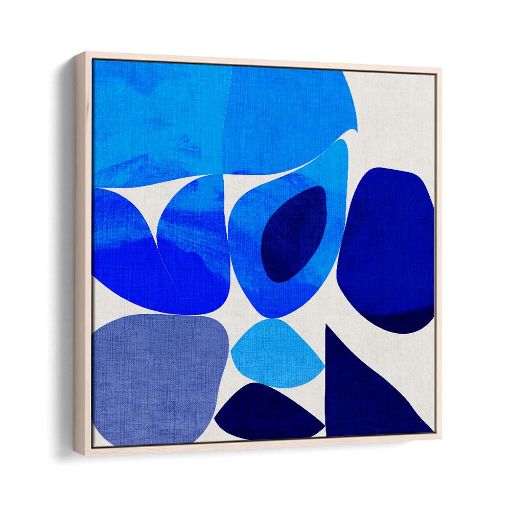 Blue Abstract Kopie III, abstract paintings by Ana Rut Bre, showcase vibrant blue shapes in a modern oak frame.