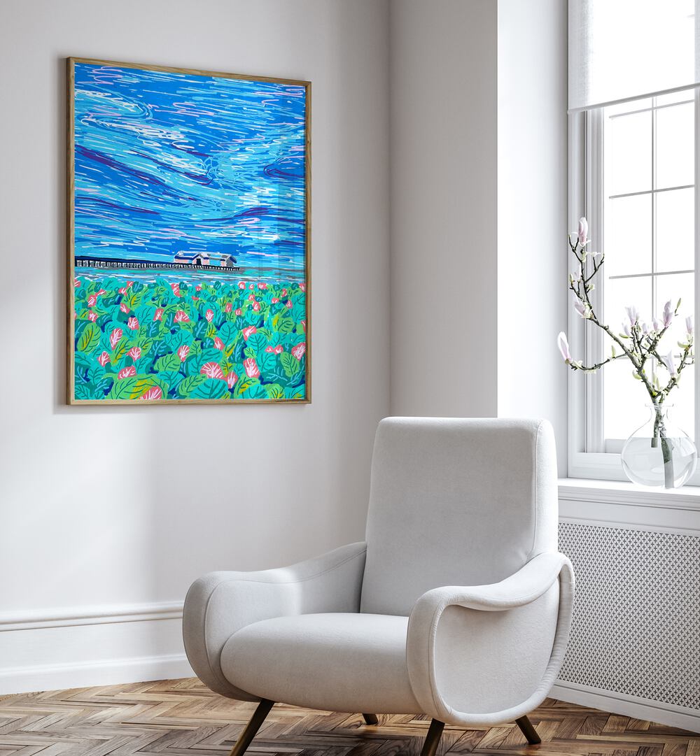 Boathouse By Key And Sea Creative Landscape Art Print in Oak Wood Plain Frame on white wall beside a chair