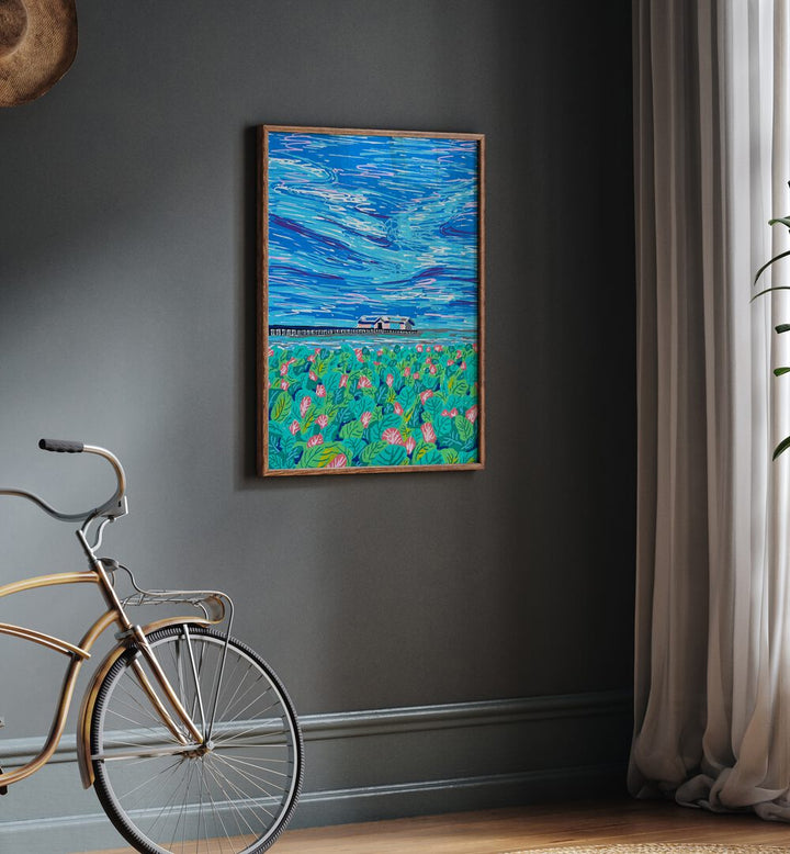 Boathouse By Key And Sea Creative Landscape Art Print in Oak Wood Plain Frame on a grey wall beside a bicycle