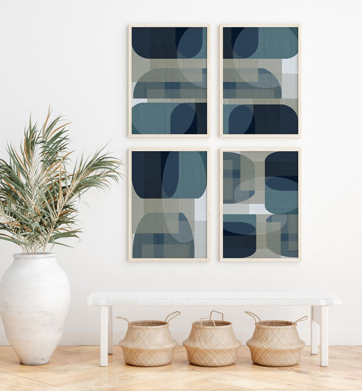 Sophisticated Cartissi Artworks Gallery Wall features four framed abstract prints in blue and beige for elegant decor.