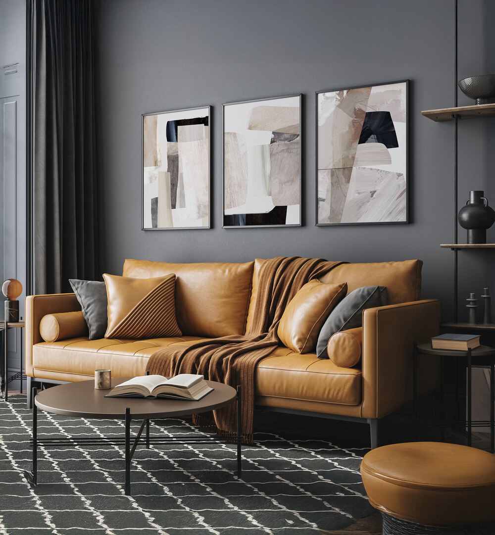 Stylish living room featuring the CLAY CAVES SET, SET OF 3 PAINTINGS, enhancing modern home decor with artistic flair.