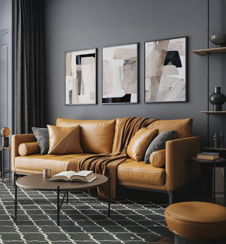 Stylish living room featuring the CLAY CAVES SET, SET OF 3 PAINTINGS, enhancing modern home decor with artistic flair.