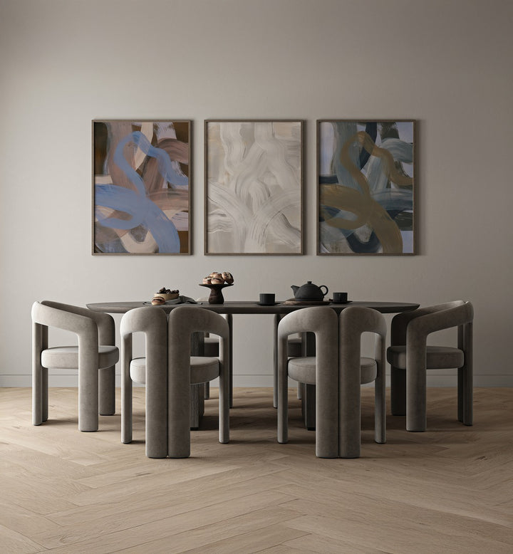 Stylish dining area featuring the COLORWAVE BRUSH STROKES SET, SET OF 3 PAINTINGS for a vibrant touch.