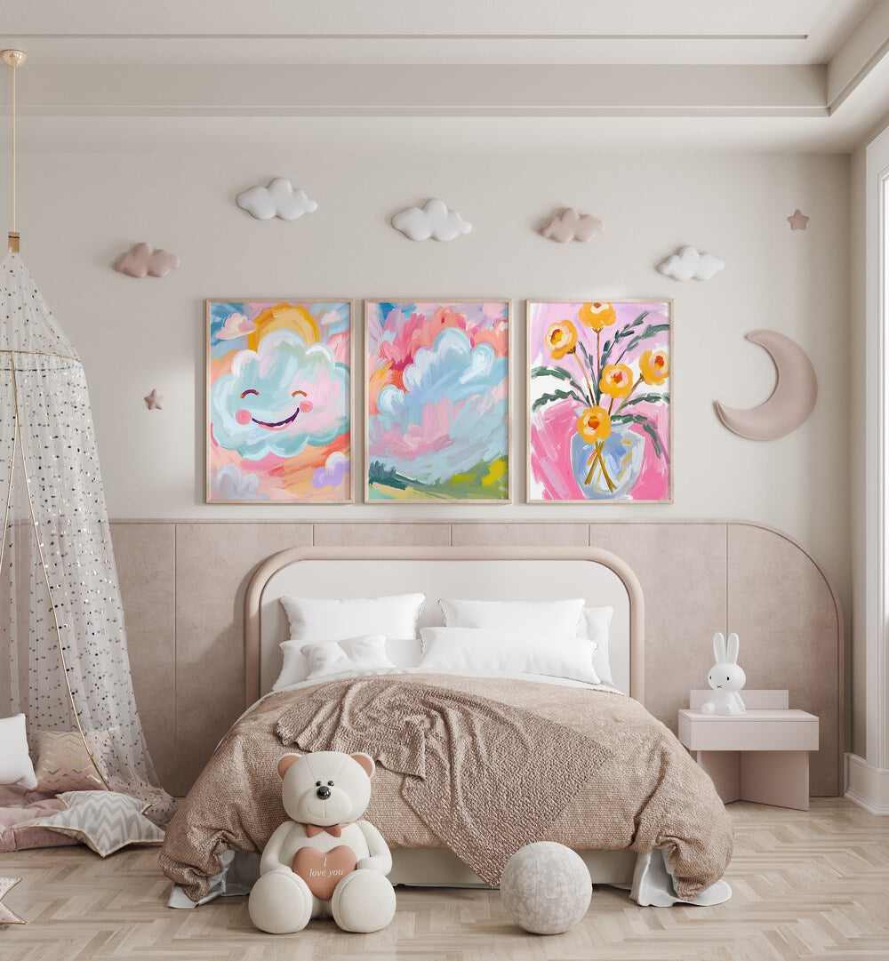 Brighten your home with the COLOURFUL CLOUDS SET , SET OF 3 PAINTINGS, featuring whimsical cloud designs.