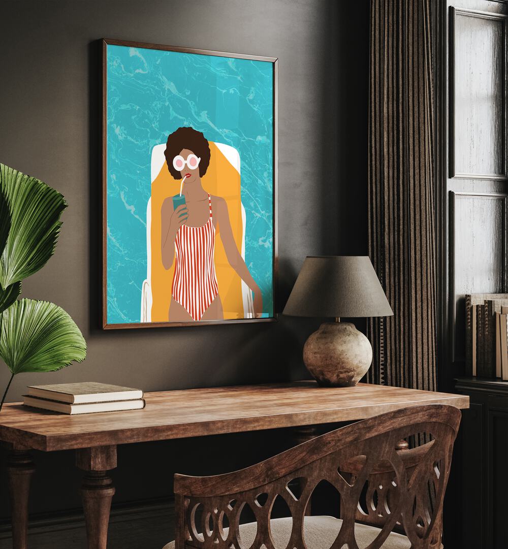 Stylish woman relaxing with a drink, showcasing "CHILLING IN THE MOMENT, PORTRAITS" by Uma Gokhale.
