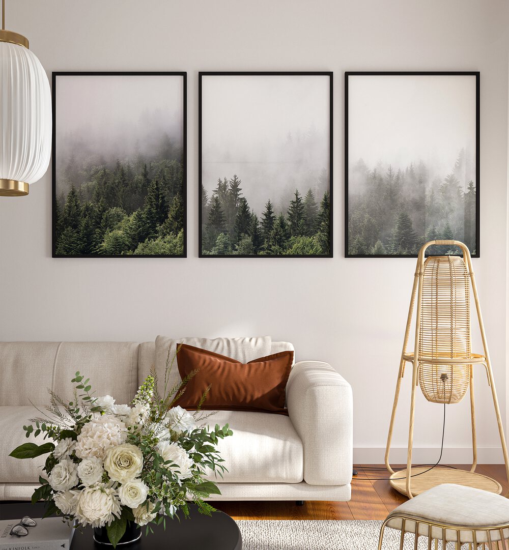 Enhance your decor with the CLOUDY MOUNTAINS, SET OF 3 PAINTINGS, showcasing serene, misty forest landscapes.