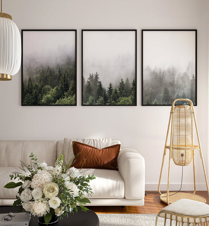 Enhance your decor with the CLOUDY MOUNTAINS, SET OF 3 PAINTINGS, showcasing serene, misty forest landscapes.