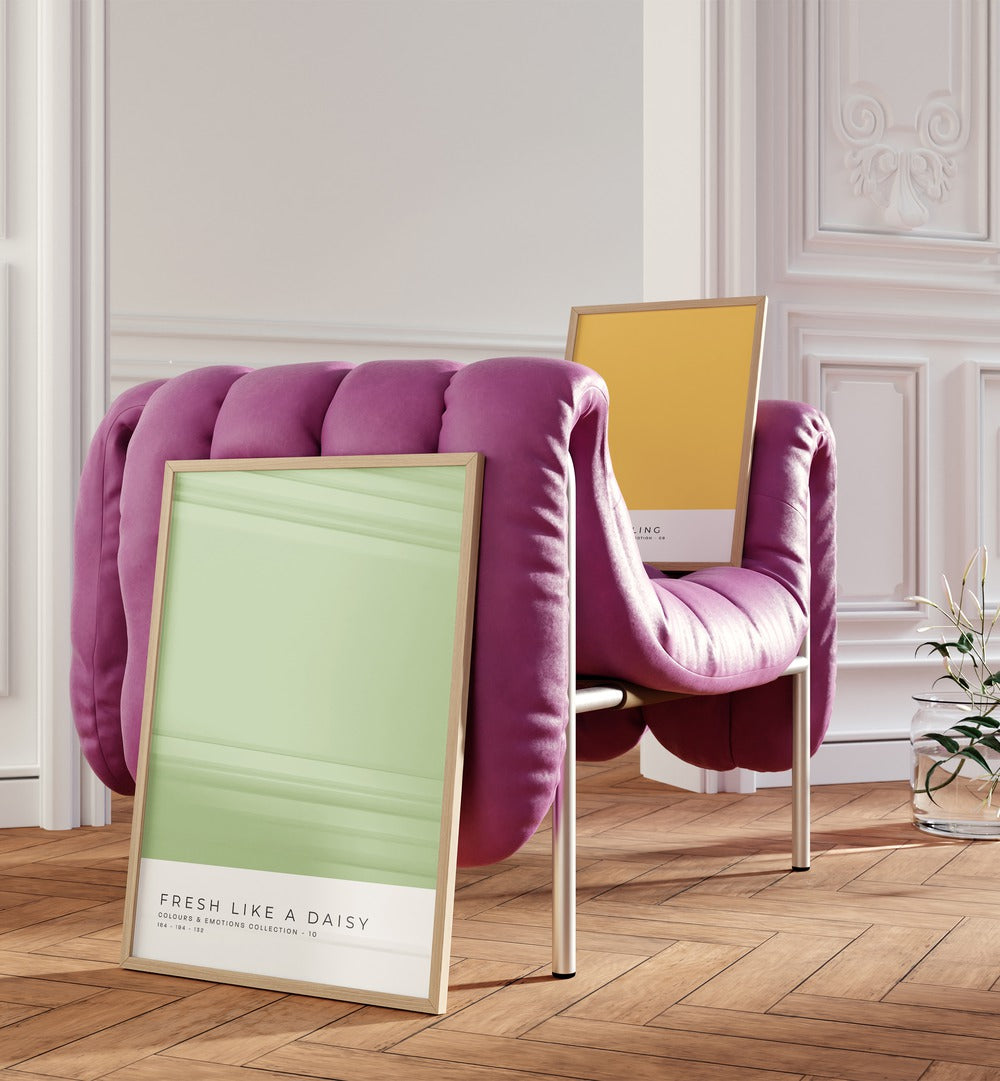 Stylish COLOR PALETTE GALLERY WALL featuring vibrant prints beside a chic pink chair, perfect for modern GALLERY WALLS.