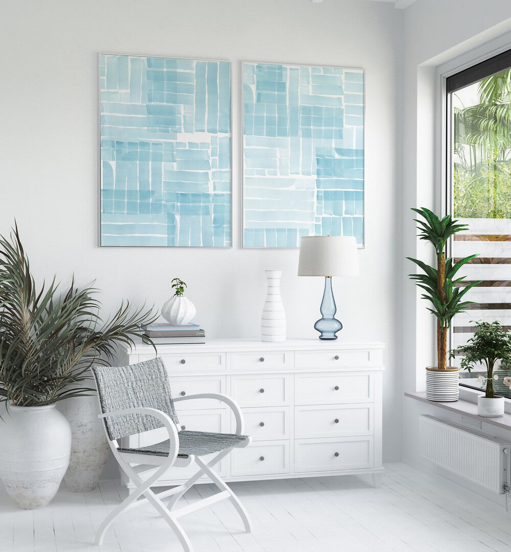 Transform your space with the CRYSTAL LAGOON SET, SET OF 2 PAINTINGS, featuring tranquil blue hues for serene decor.