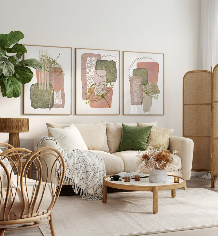 Stylish living room featuring the DELICATE PINK AND GREEN SET, SET OF 3 PAINTINGS, enhancing modern decor.