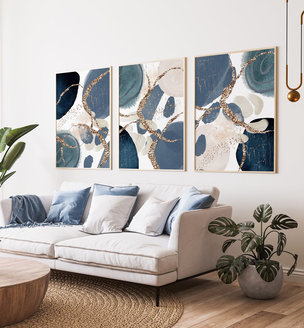Elevate your decor with the DENIM BLUE SET, SET OF 3 PAINTINGS, showcasing rich hues and artistic elegance.