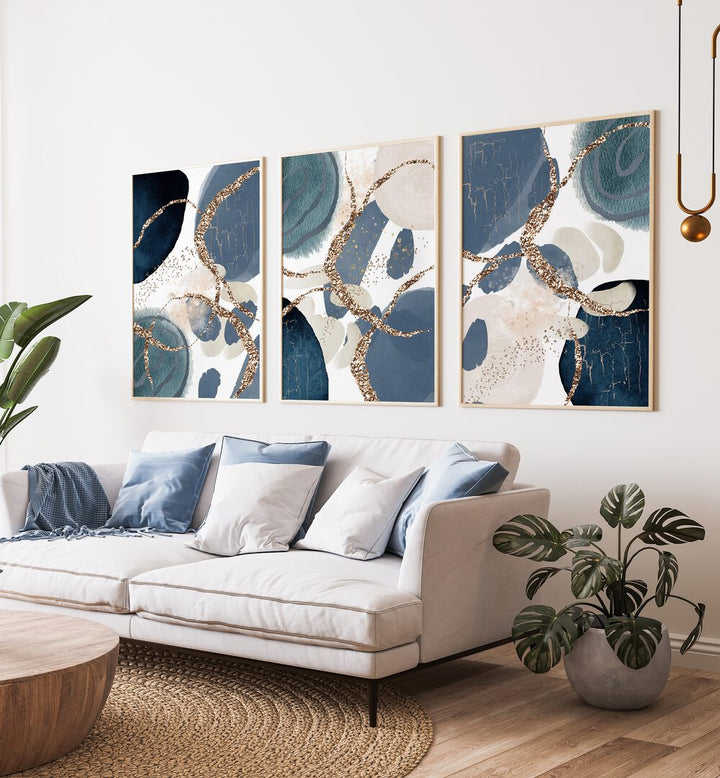 Elevate your decor with the DENIM BLUE SET, SET OF 3 PAINTINGS, showcasing rich hues and artistic elegance.
