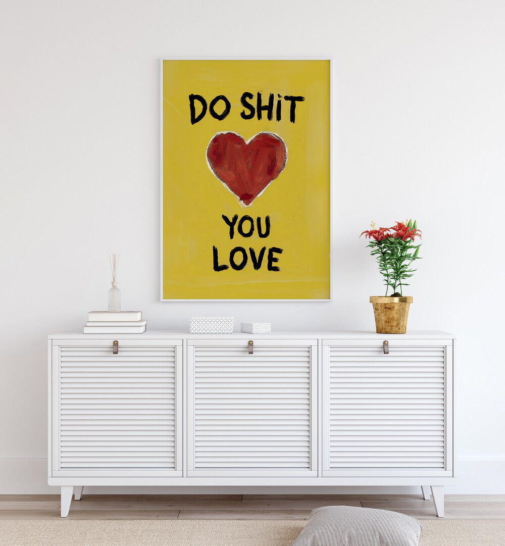 Bright yellow poster featuring "DO SHIT YOU LOVE, QUOTES" to inspire passion and happiness in your space.