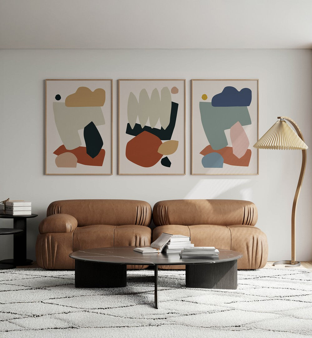 Stylishly decorate your home with the EARTH COLLAGE SET, SET OF 3 PAINTINGS, showcasing natural beauty indoors.