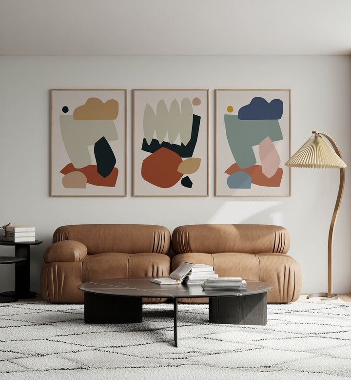 Stylishly decorate your home with the EARTH COLLAGE SET, SET OF 3 PAINTINGS, showcasing natural beauty indoors.