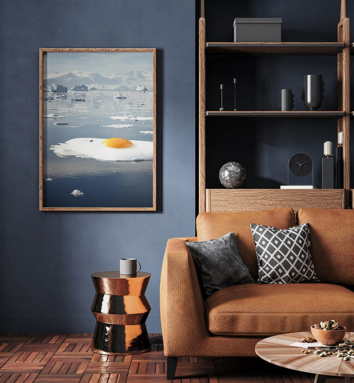 Bright yellow egg on icebergs in a surreal scene, perfect for your decor. Explore EGG-BERG, SURREAL ART PRINTS by Vertigo Artography.