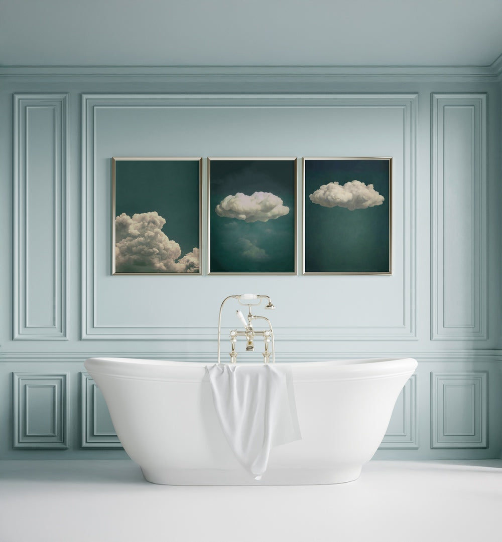 Transform your space with the EMERALD CLOUDS SET, SET OF 3 PAINTINGS featuring tranquil emerald hues and soft clouds.
