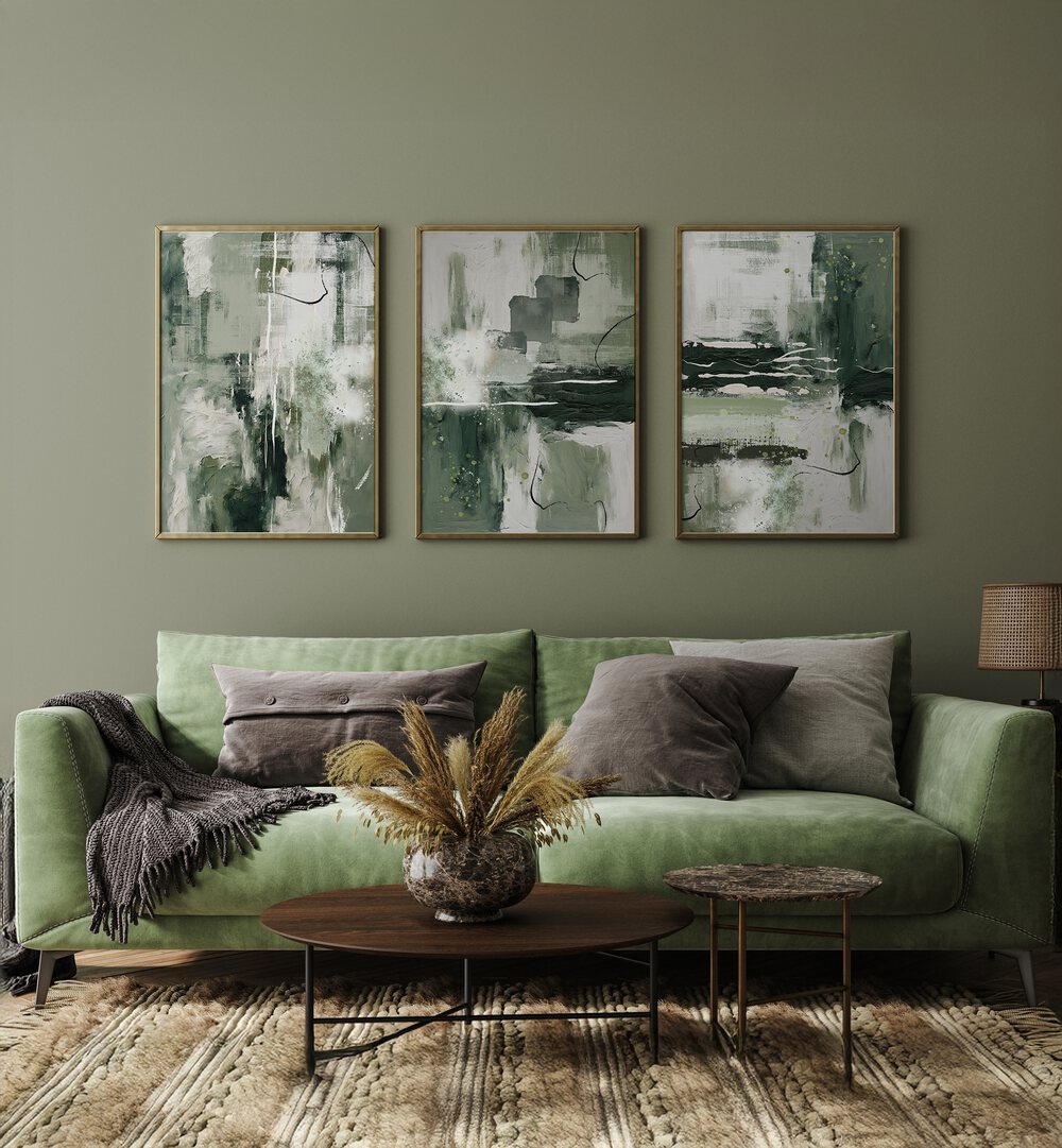 Stylish living room featuring the EMERALD GROVE SET, SET OF 3 PAINTINGS, perfect for a serene home atmosphere.