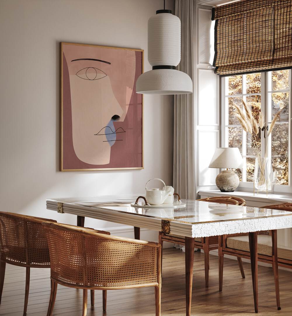 Stylish dining area featuring FACE ME, BOHO ART PAINTINGS, enhancing modern aesthetics and interior beauty.