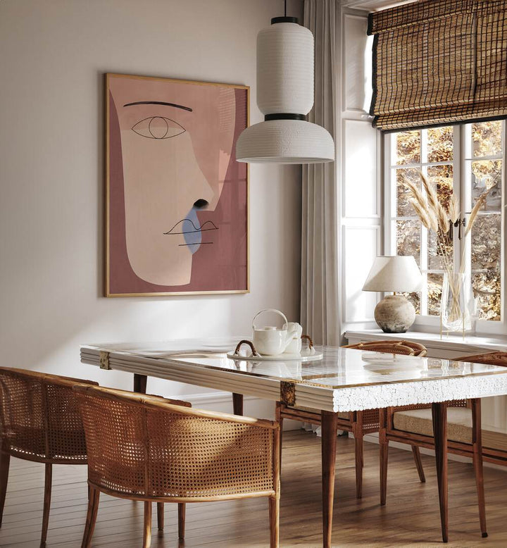 Stylish dining area featuring FACE ME, BOHO ART PAINTINGS, enhancing modern aesthetics and interior beauty.