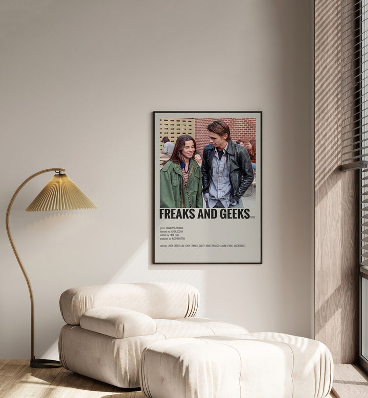 Freaks And Greaks Movie Posters in Black Plain Frame placed on a white wall beside a window and behind a sofa