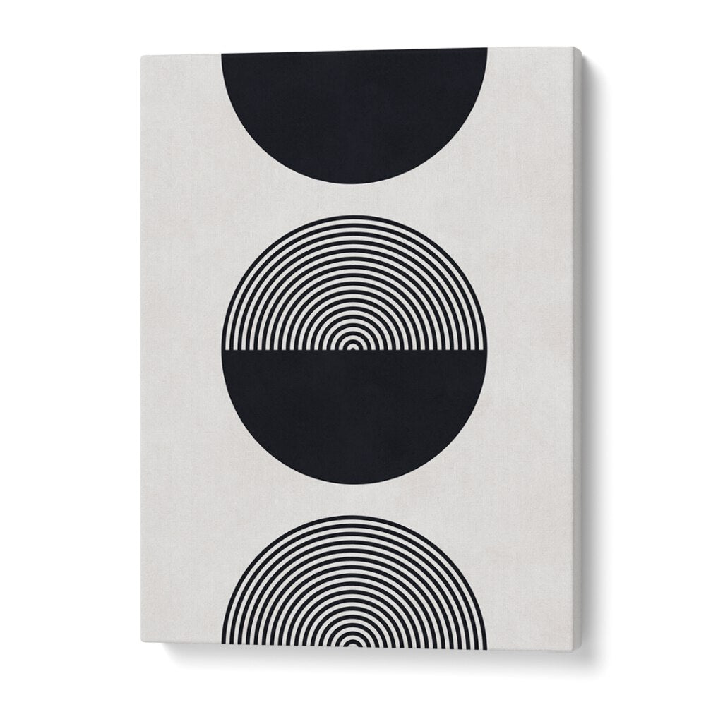 Bold black and white design featuring concentric circles, perfect for modern decor. Explore SHAPES XI, GEOMETRIC ART PRINTS.