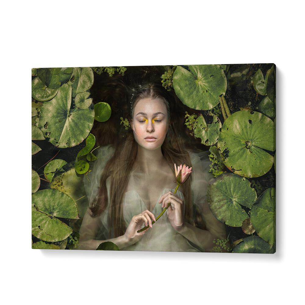 A serene woman surrounded by lily pads, showcasing the enchanting SILENT DREAM, PHOTOGRAPHY PRINTS collection.