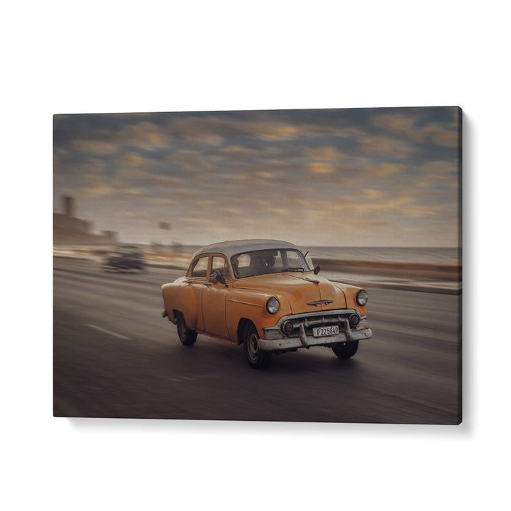 Explore the vibrant MALECON VII, PHOTOGRAPHY PRINTS, showcasing a classic car in a lively street scene.