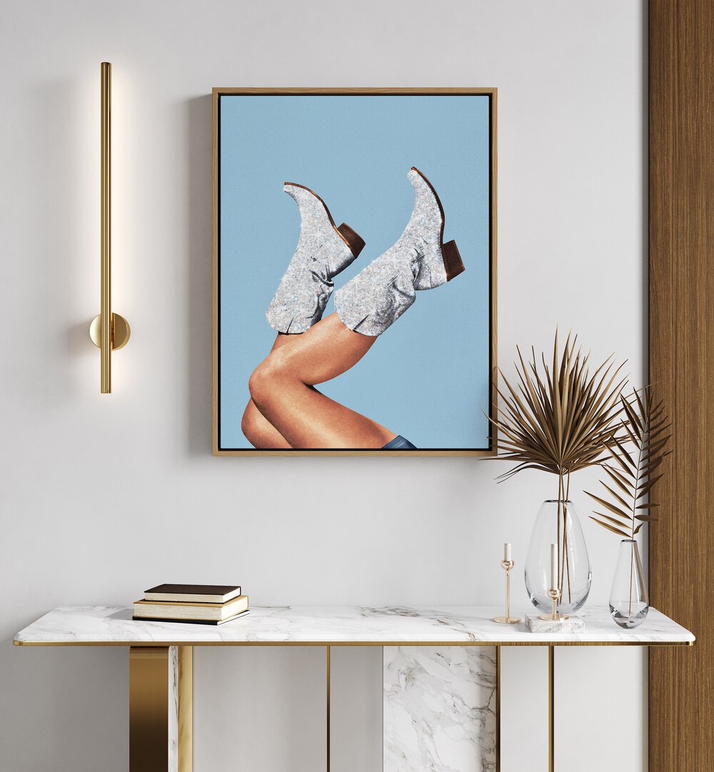 Stylish legs in sparkling boots against a blue backdrop, featuring GLITTER BOOTS BLUE II, SURREAL ART PRINTS by Vertigo Artography.