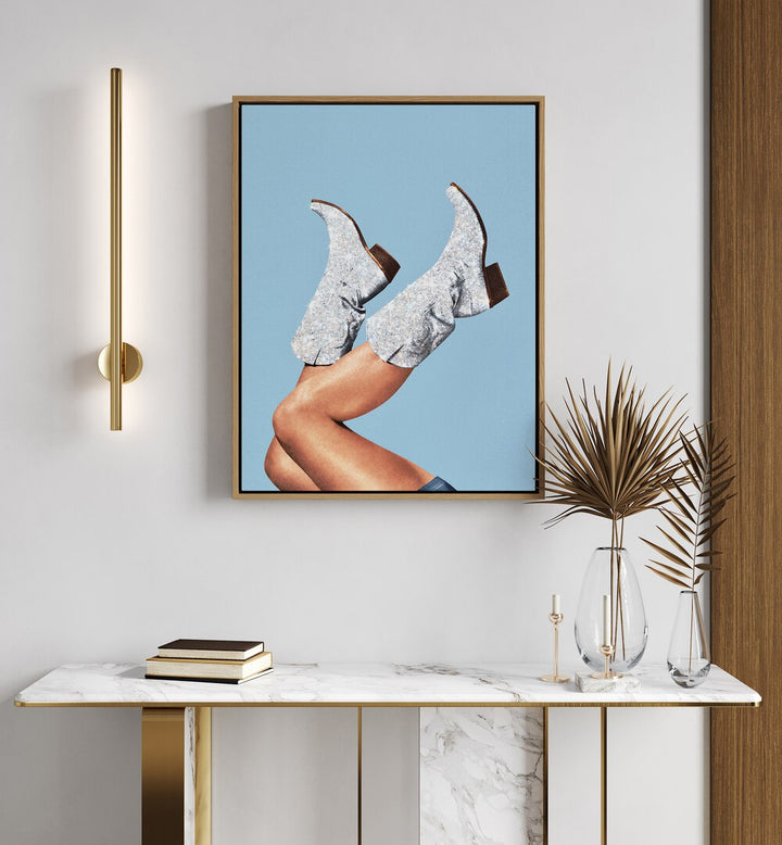 Stylish legs in sparkling boots against a blue backdrop, featuring GLITTER BOOTS BLUE II, SURREAL ART PRINTS by Vertigo Artography.