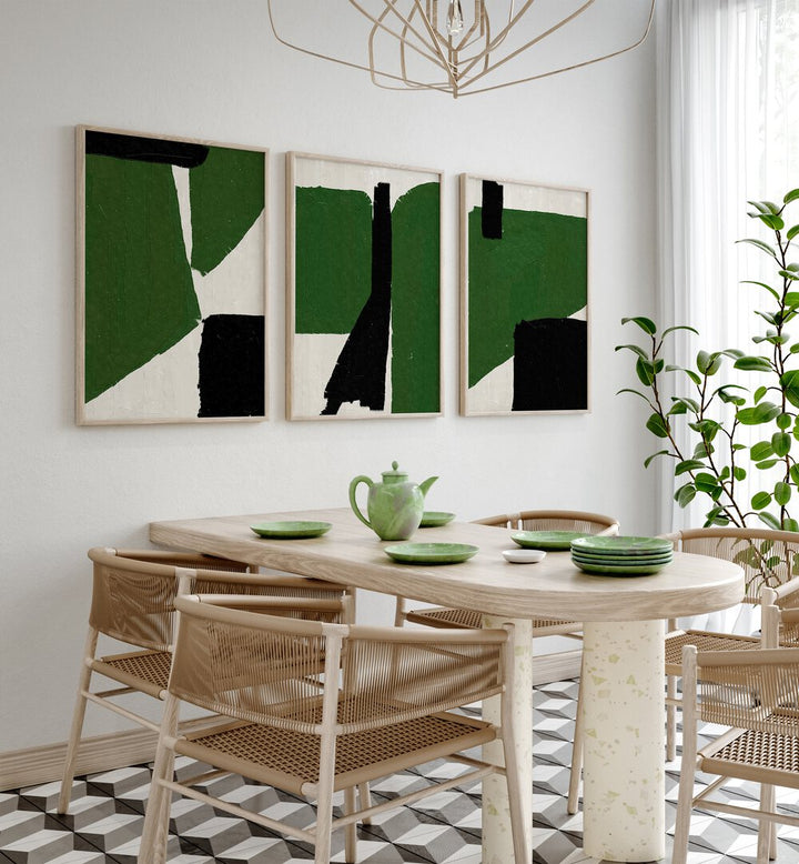 Stylish dining area featuring the GREEN BLACK OIL ABSTRACT SET, SET OF 3 PAINTINGS, enhancing modern decor.