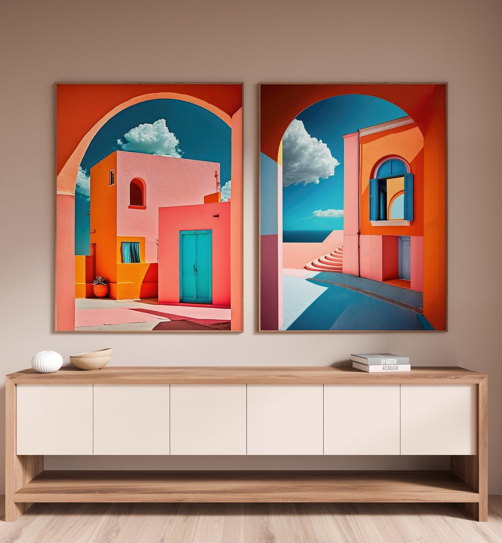 Brighten your decor with the GEOMETRICAL VILLAGE SET, SET OF 2 PAINTINGS showcasing vibrant minimalist architecture.