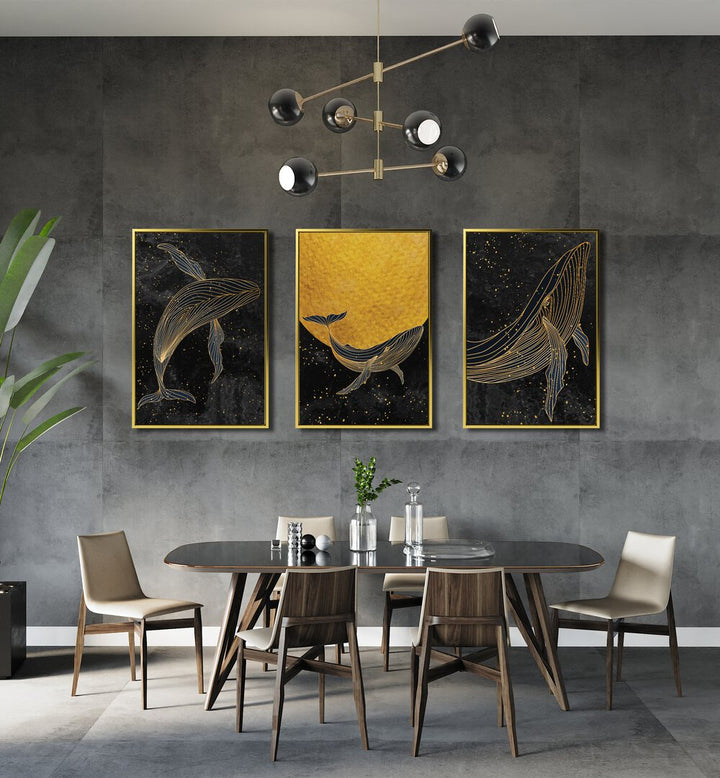 Enhance your space with the GOLDEN MARINA, SET OF 3 PAINTINGS featuring majestic whales against a starry night.