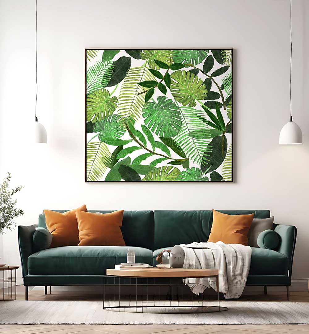 GREEN TROPICAL WATERCOLOR LEAVES , FLORAL FLOWER PAINTINGS framed botanical print above green velvet sofa in modern living room