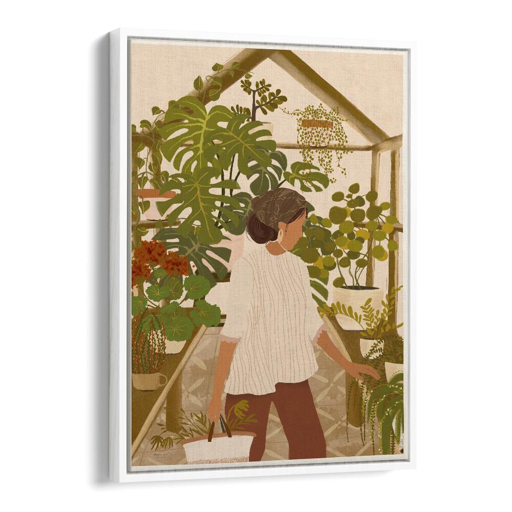 Woman tending to plants in a greenhouse, showcasing GREENHOUSE, FLORAL FLOWER PAINTINGS by Andi Bell for serene decor.