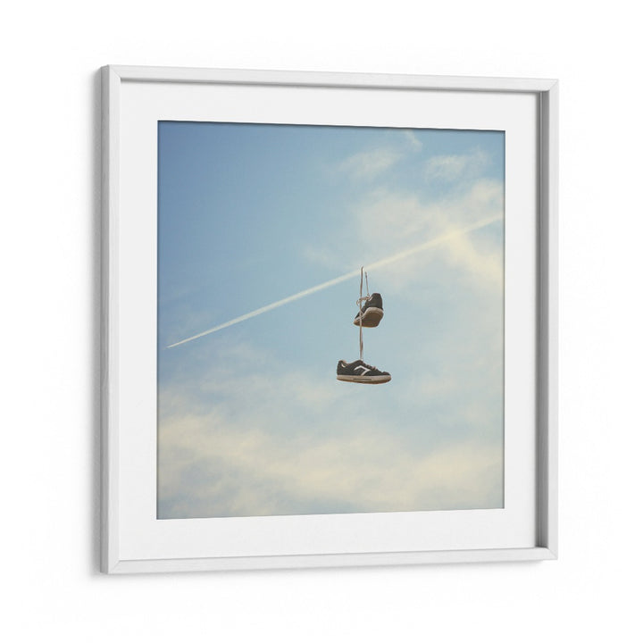 HANG N THERE SURREAL PAINTING, SURREAL ART features hanging sneakers against a serene sky, perfect for modern decor.