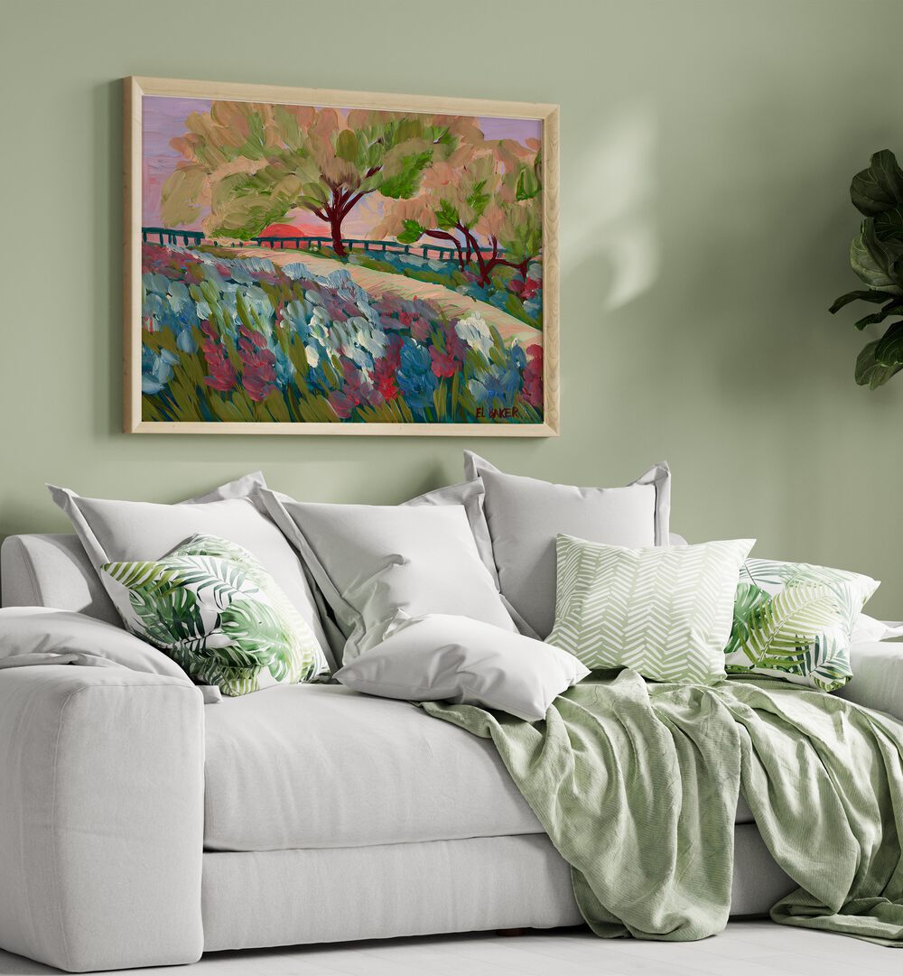 Bright HILL COUNTRY SUNRISE, LANDSCAPE PAINTINGS adorn a cozy living room, enhancing the serene atmosphere beautifully.
