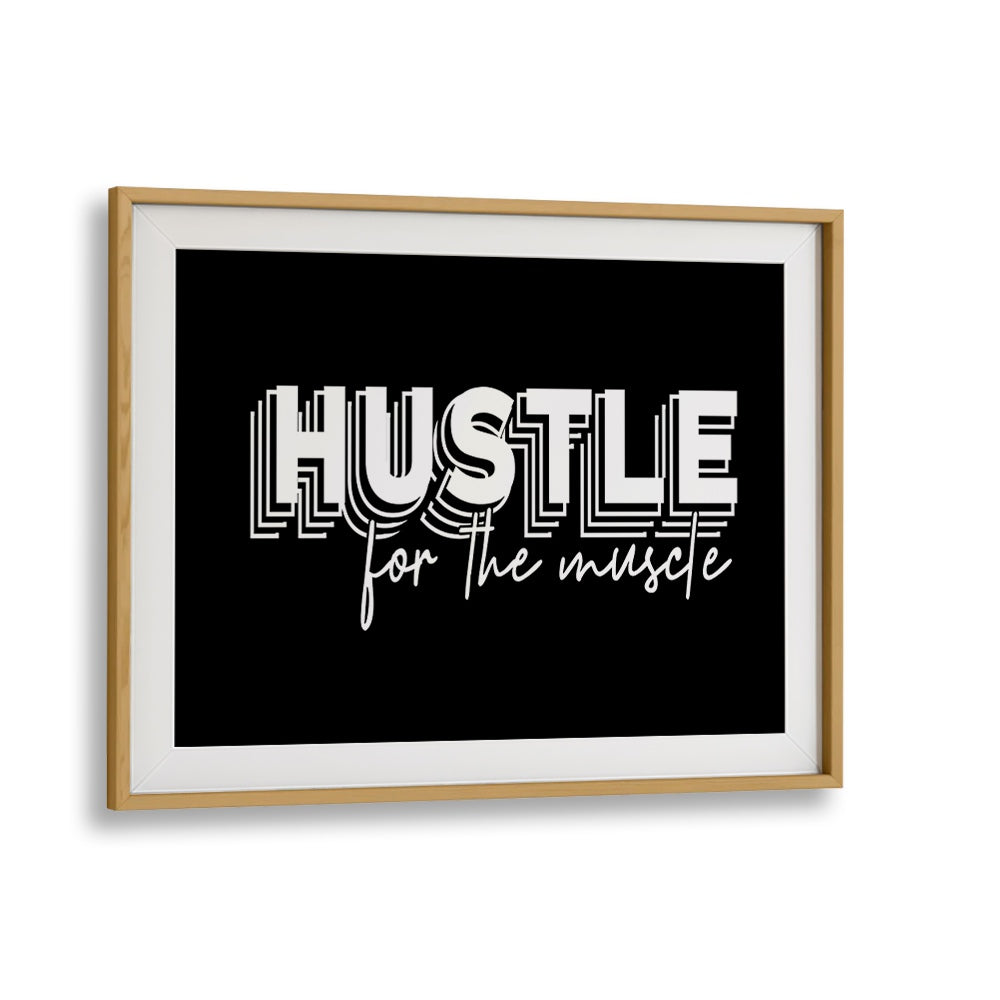 HUSTLE FOR THE MUSCLE, QUOTES poster in a sleek oak frame, perfect for inspiring fitness enthusiasts.