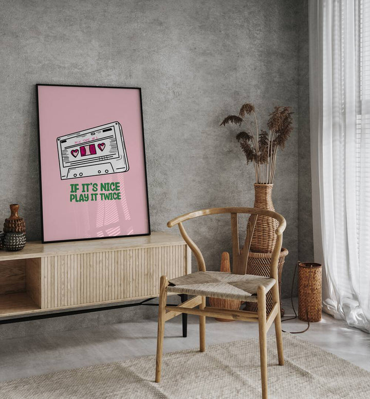 Bright room featuring "IF IT'S NICE PLAY IT TWICE, MOVIE POSTERS" on the wall, perfect for music lovers' decor.